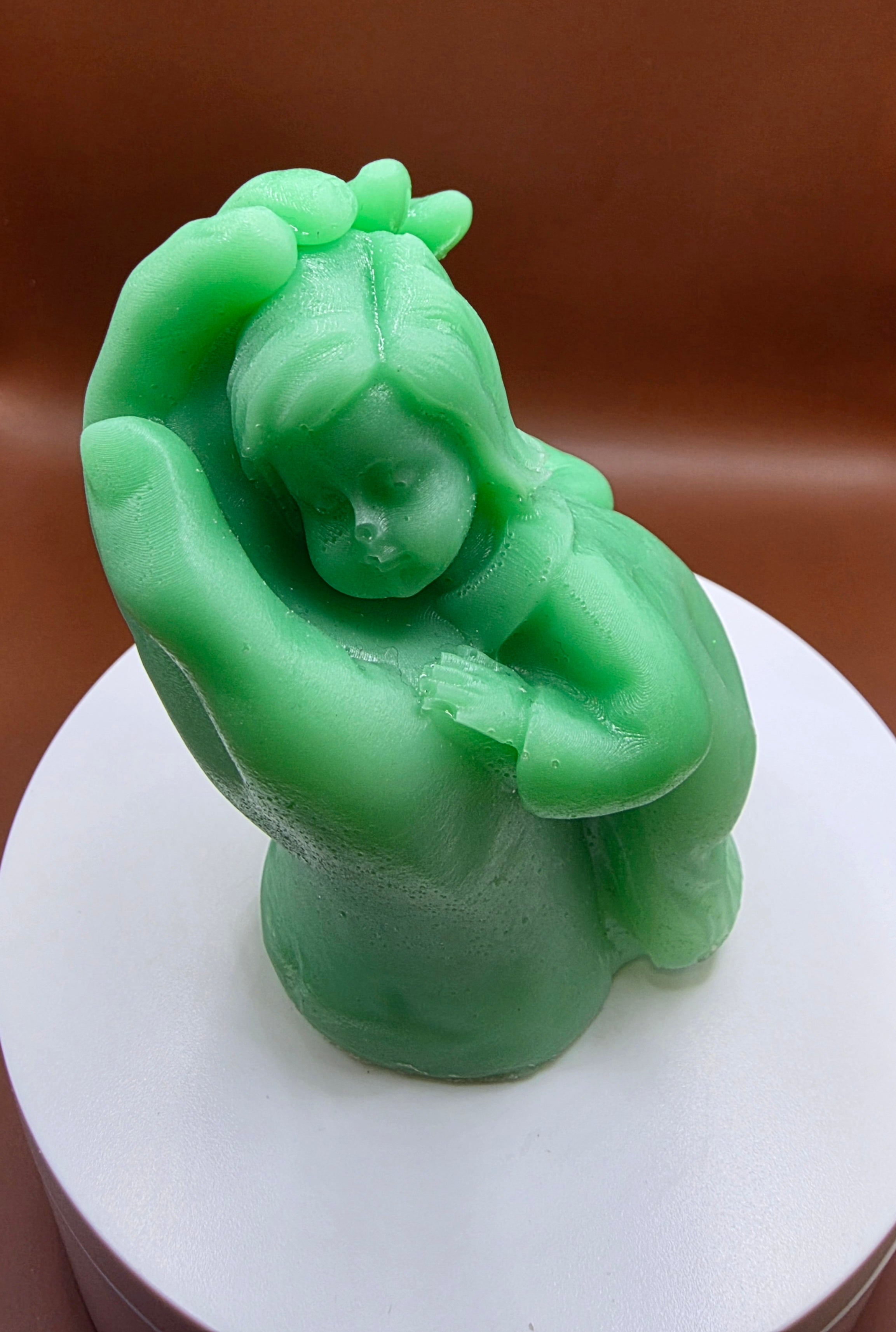 Child laid on the hand.