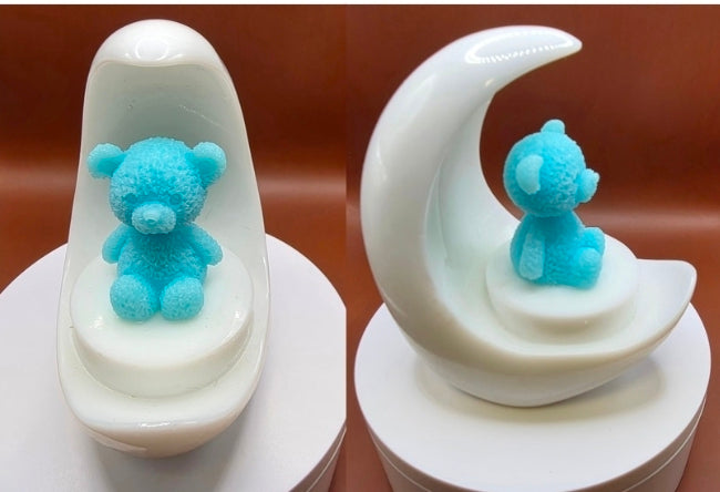 Cherub or Teddy on the Moon.