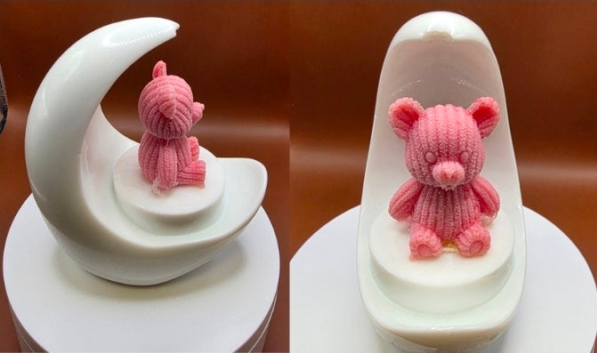 Cherub or Teddy on the Moon.