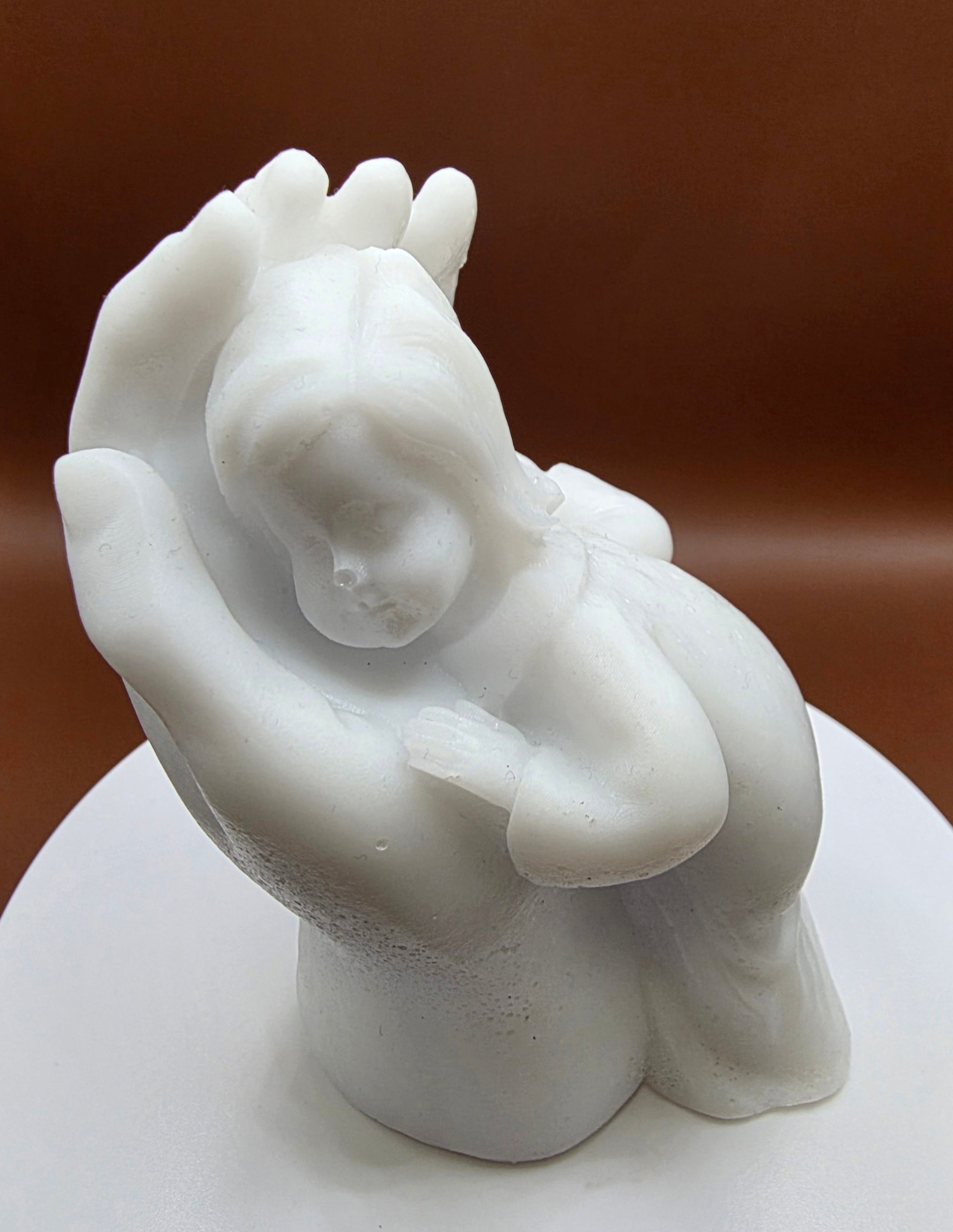 Child laid on the hand.