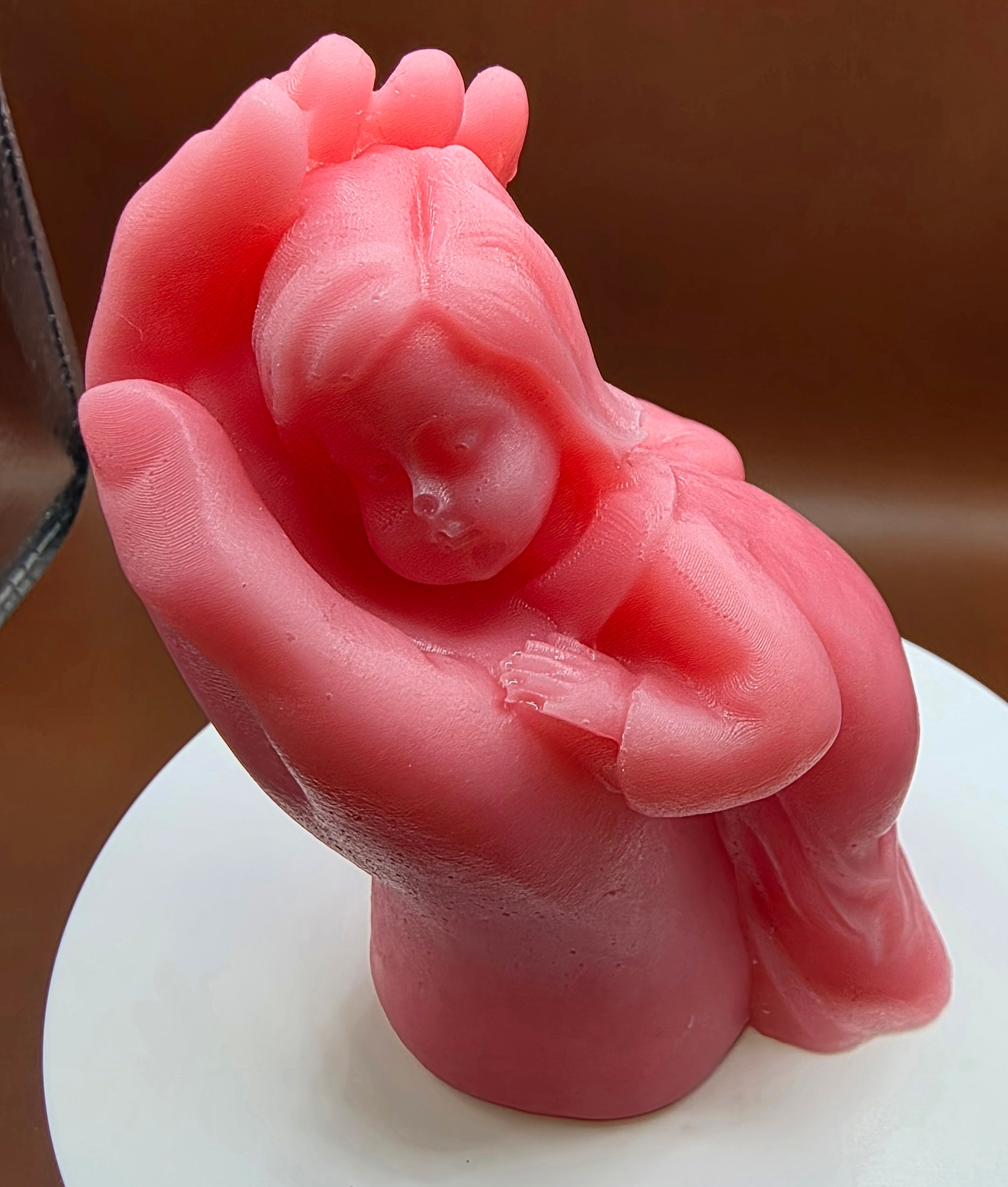 Child laid on the hand.